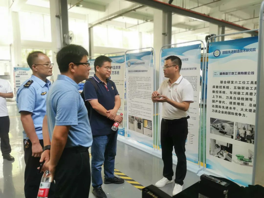 交流 | 华中科技大学武汉光电国家研究中心党委委员周铭一行来园区调研